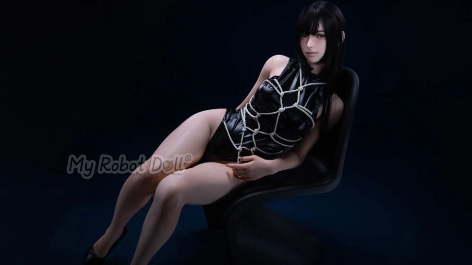 Close-up of gothic doll with dark eyes and elegant accessories