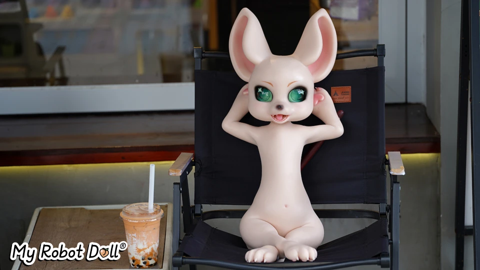 Mouse sex doll sitting on chair with big ears and green eyes