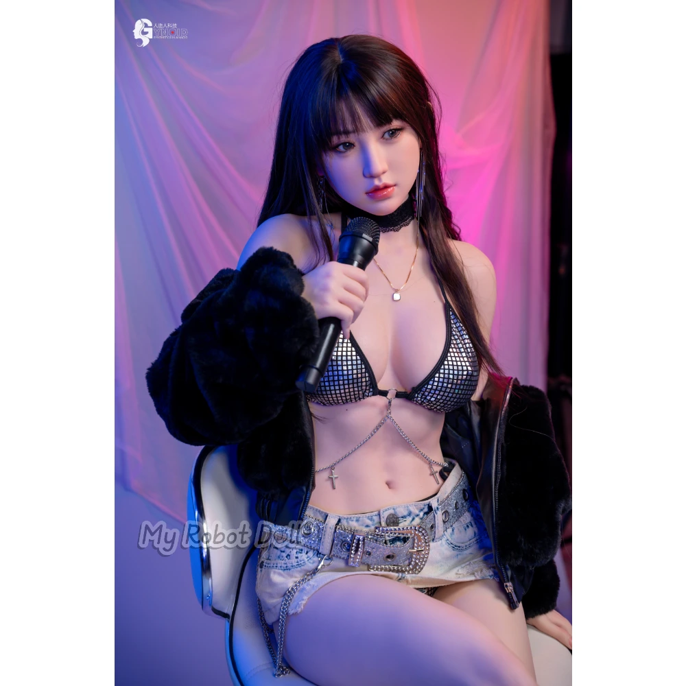 Sex Doll Limi Gynoid Head Model 24 - 156Cm / 5'1&Quot; 1 Gynoid 23R 156Cm Doll With Long Dark Hair, Black Hooded Jacket, Metallic Bikini Top, Denim Skirt, And Full-Body Fashion Styling