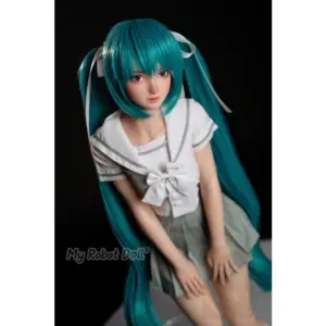 BC Dolls F01A Miku 61cm anime-style doll with long teal twin-tail hair, green eyes, white sailor-style top, grey pleated skirt, and matching hair ribbons.